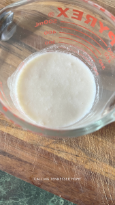 buttermilk substitute in a glass measuring cup